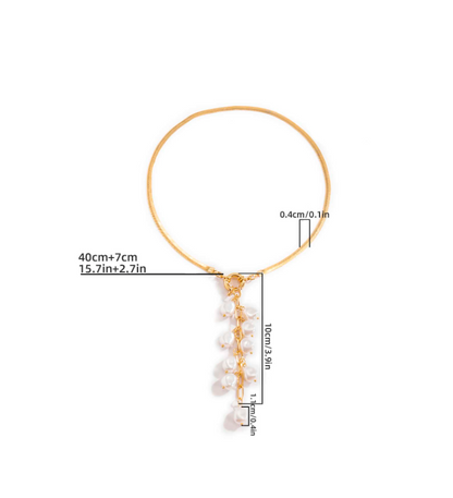 Gold necklace with pearl drops and measurements on a white background