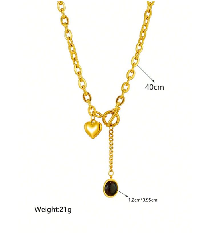 Gold necklace with heart and round pendant, labeled with length and weight.