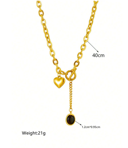 Gold necklace with heart and round pendant, labeled with length and weight.
