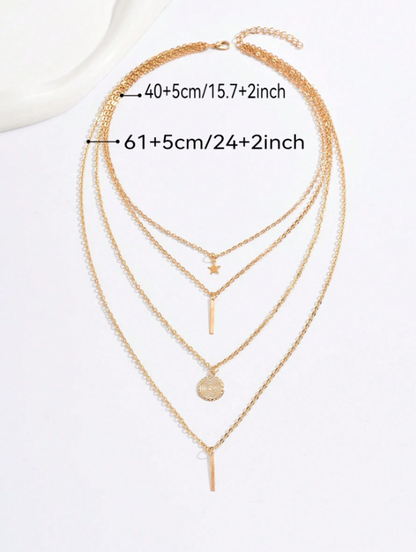 Gold necklace with multiple layers on a white background