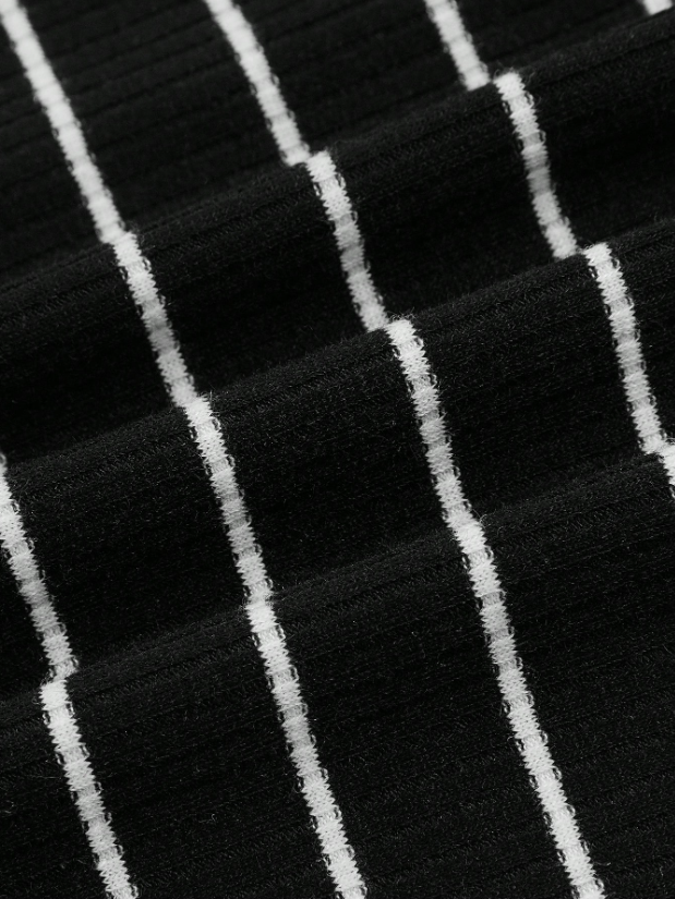 Close-up of black fabric with white pinstripes