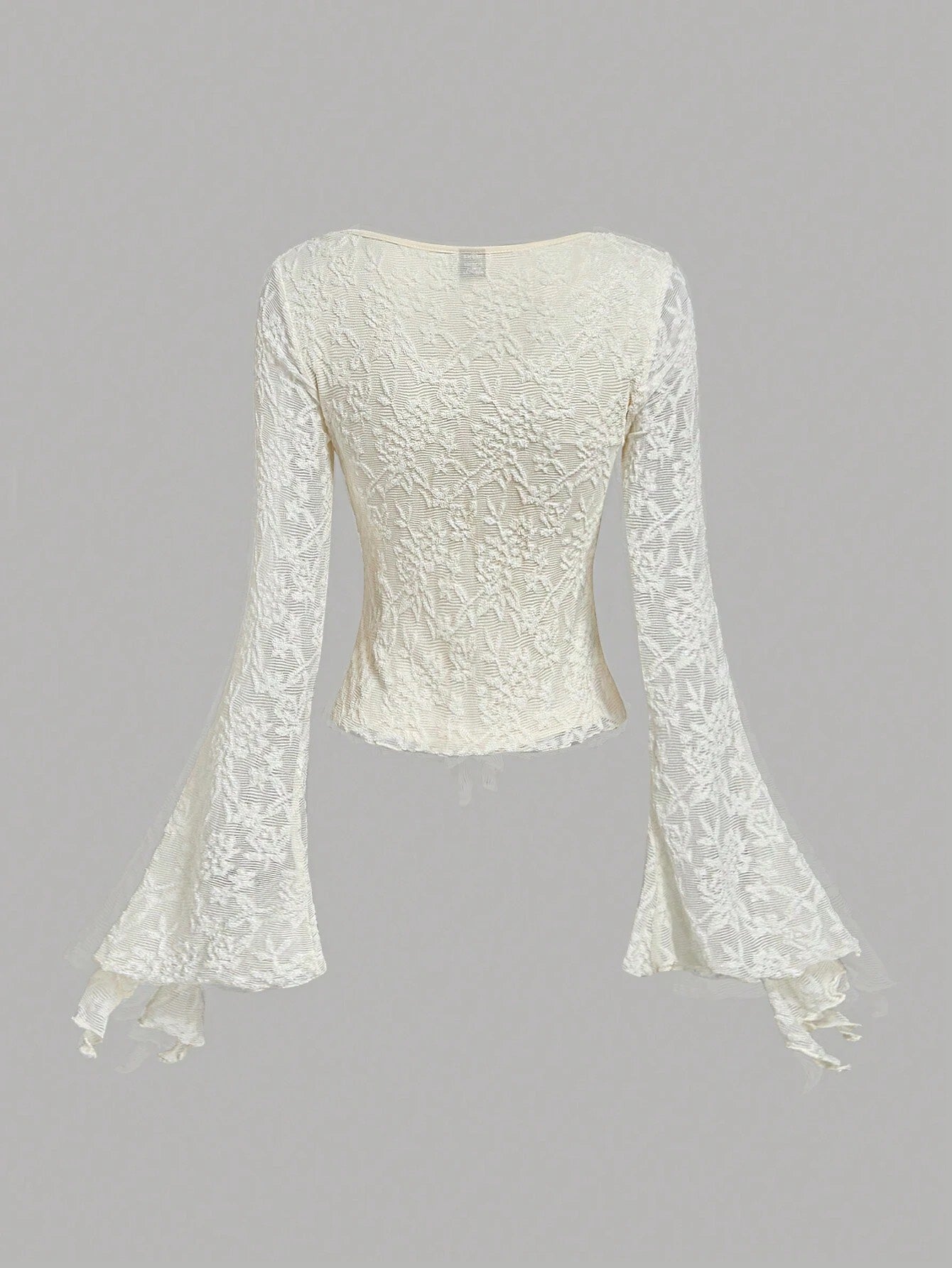 Apricot sheer floral lace tie-front long flare sleeve top laid flat against a neutral background