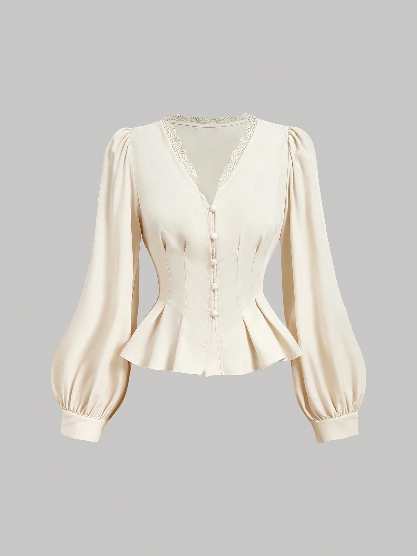 Apricot striped long-sleeve peplum blouse with a lace-trim V-neck, button-front closure, and lantern sleeves against a neutral background.