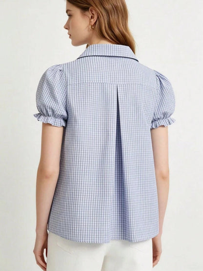 Blue and white gingham plaid short puff sleeve collared shirt with double front buttons laid flat