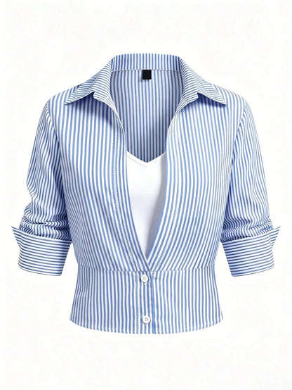 Blue and white striped 2-in-1 cropped blouse with a lapel collar and built-in white V-neck insert laid flat