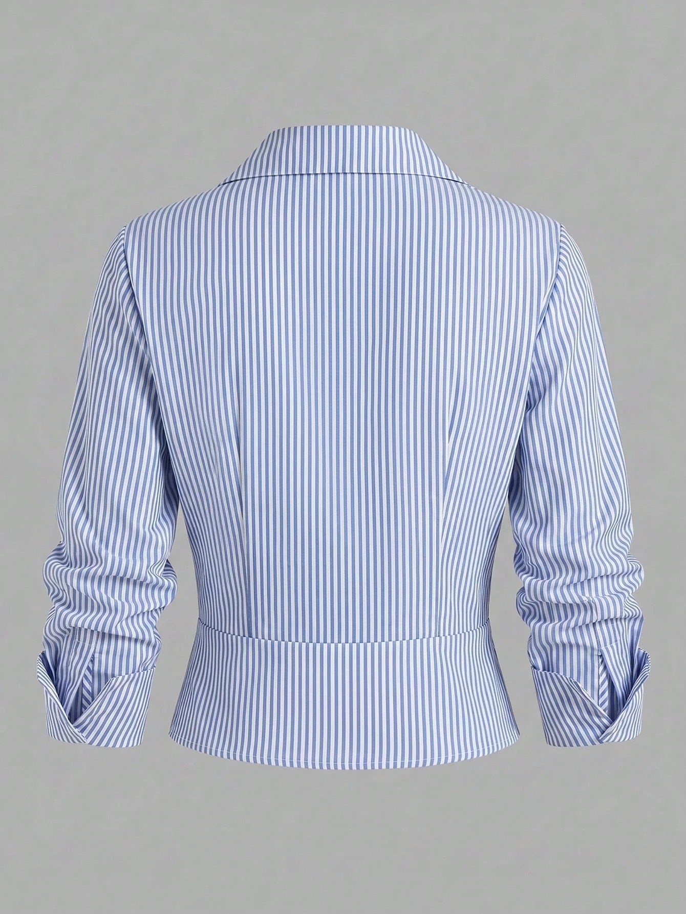 Blue and white striped 2-in-1 cropped blouse with a lapel collar and built-in white V-neck insert laid flat