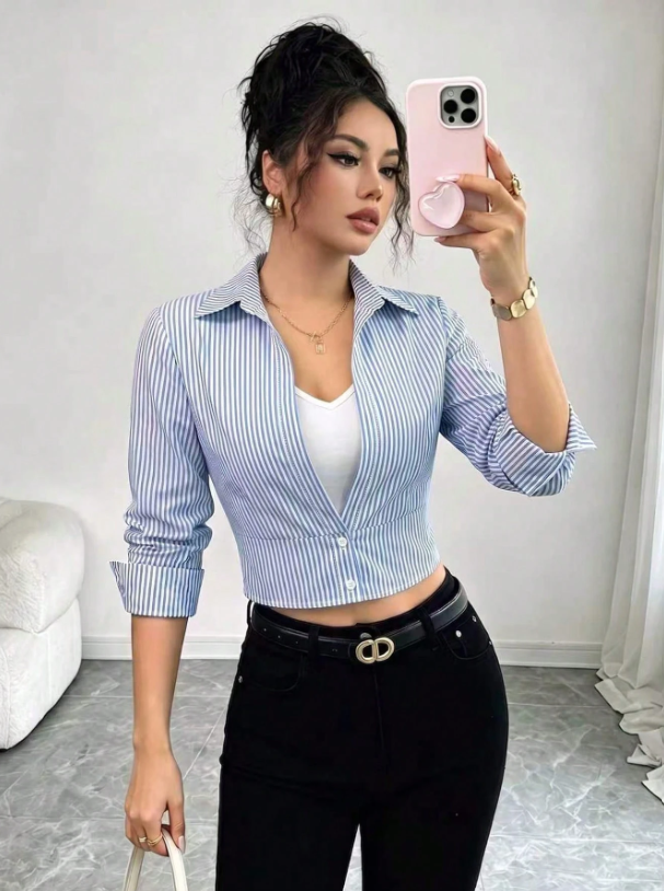 Blue and white striped 2-in-1 cropped blouse with a lapel collar and built-in white V-neck insert laid flat