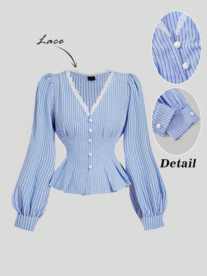 Blue and white striped long-sleeve peplum blouse with a lace-trim V-neck, button-front closure, and lantern sleeves against a neutral background.