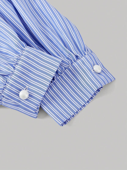 Blue and white striped long-sleeve peplum blouse with a lace-trim V-neck, button-front closure, and lantern sleeves against a neutral background.