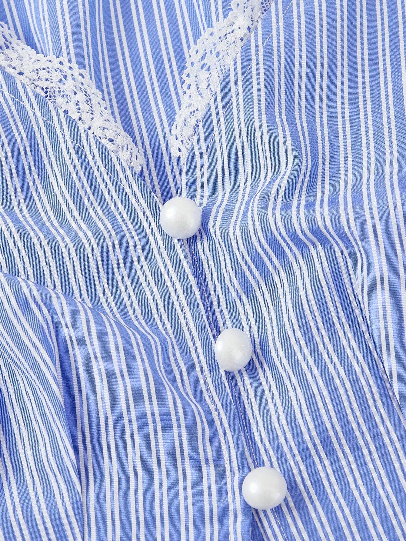 Blue and white striped long-sleeve peplum blouse with a lace-trim V-neck, button-front closure, and lantern sleeves against a neutral background.