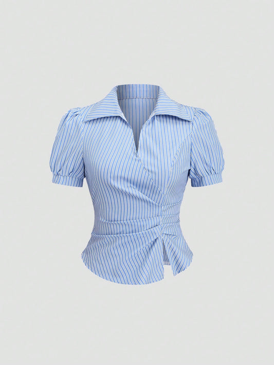 Blue and white striped short-sleeve polo collar peplum blouse with a wrap-effect ruched waist laid flat against a neutral background