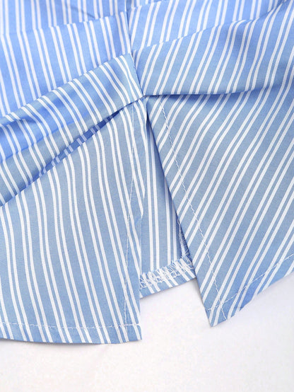 Blue and white striped short-sleeve polo collar peplum blouse with a wrap-effect ruched waist laid flat against a neutral background
