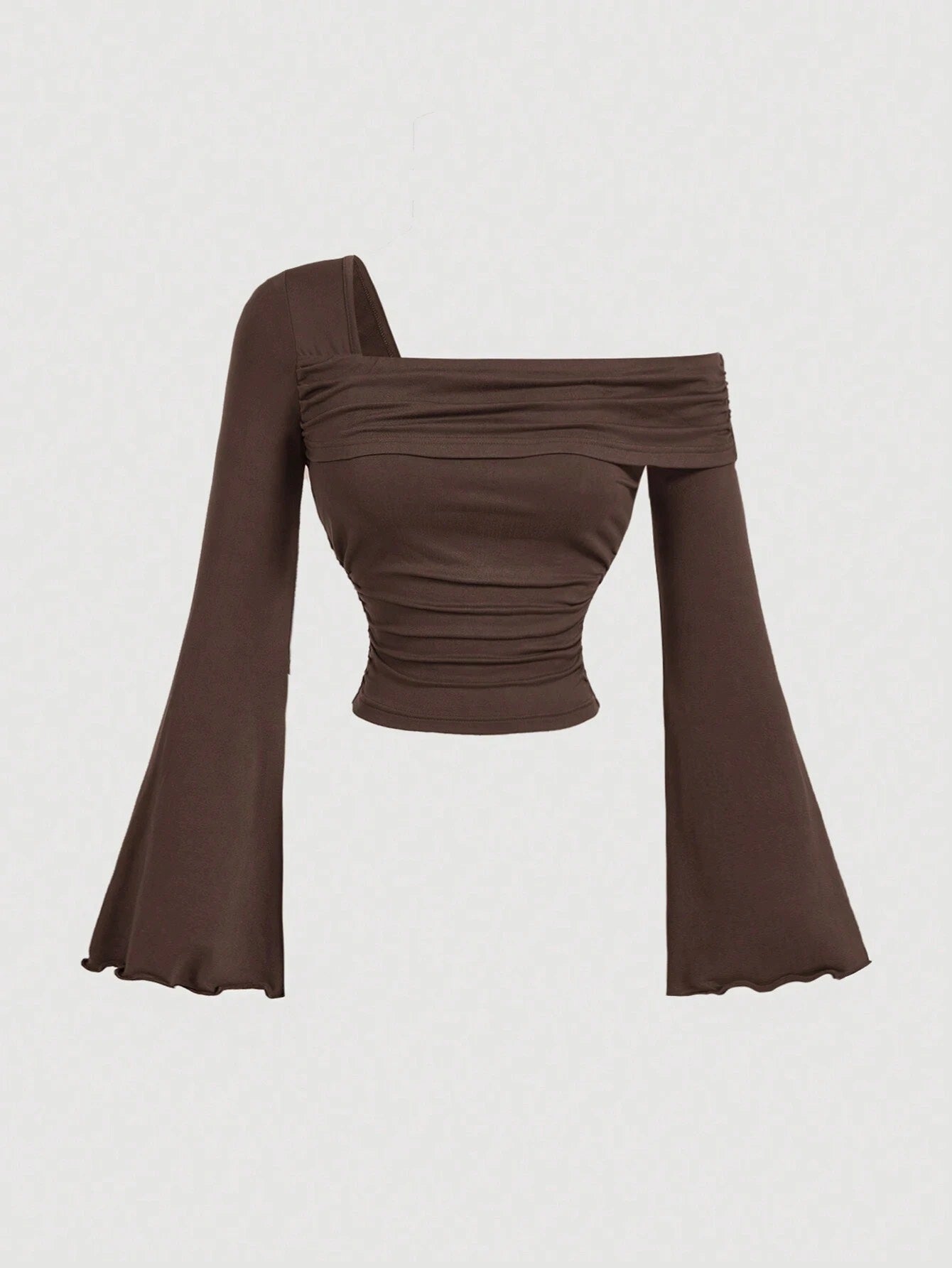 Brown asymmetric neckline ruched long flare sleeve top laid flat against a neutral background