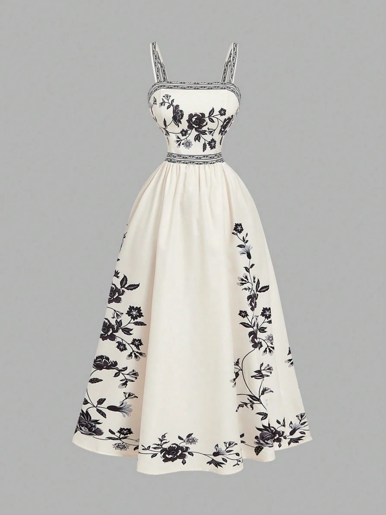 Elegant white A-line midi dress with black and white floral border print and spaghetti straps