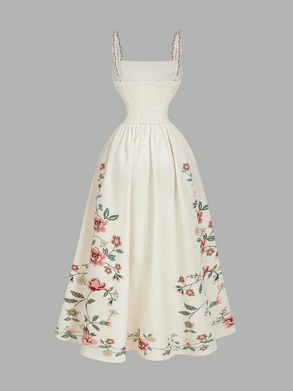 Elegant white A-line midi dress with khaki floral border print and spaghetti straps1