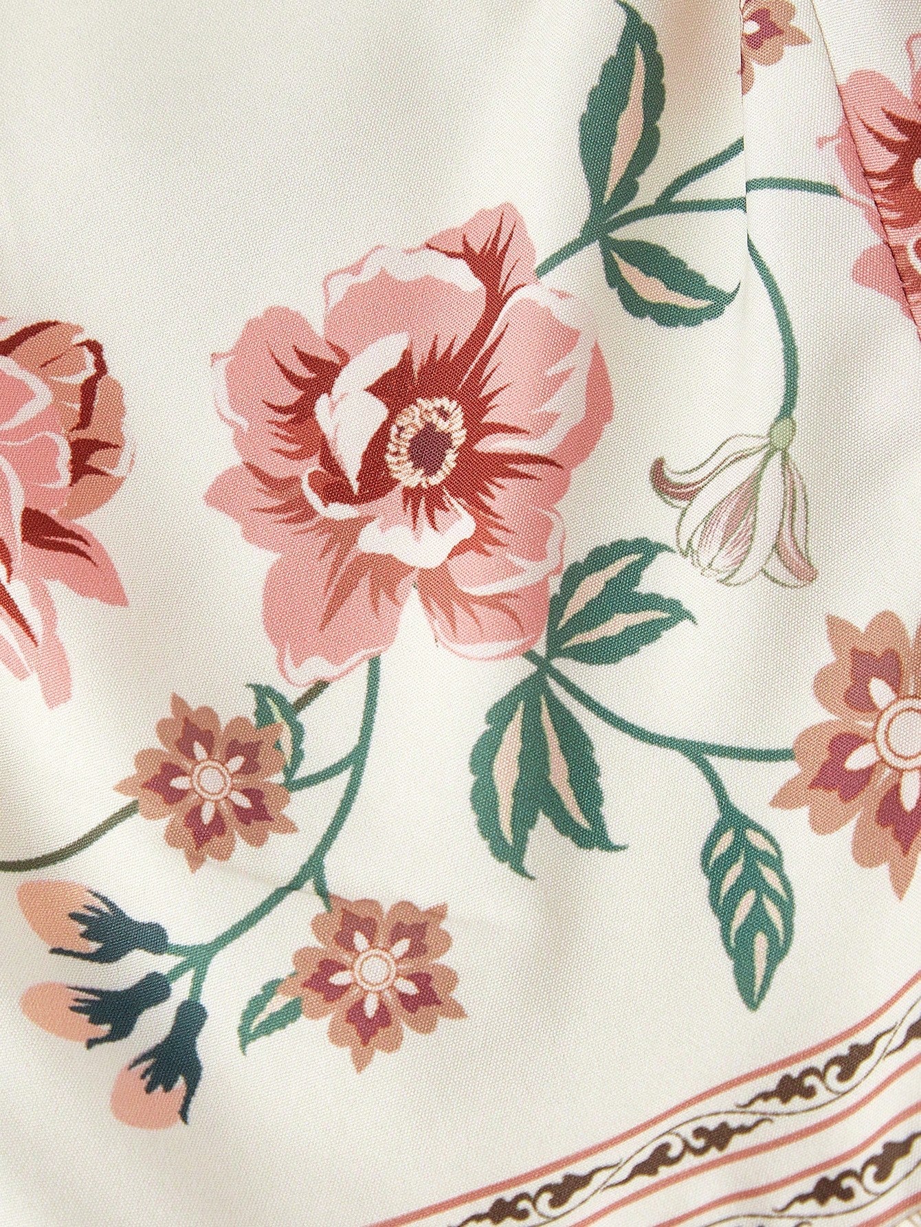 Elegant white A-line midi dress with khaki floral border print and spaghetti straps2