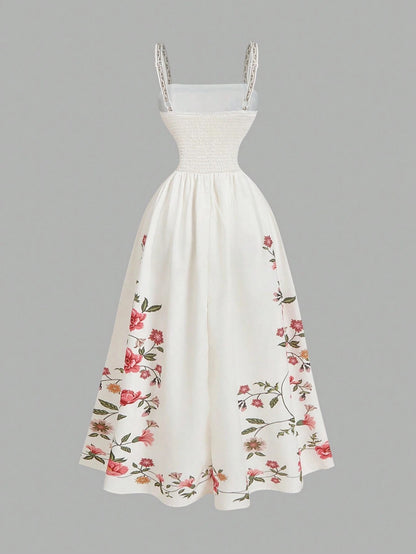 Elegant white A-line midi dress with red floral border print and spaghetti straps1