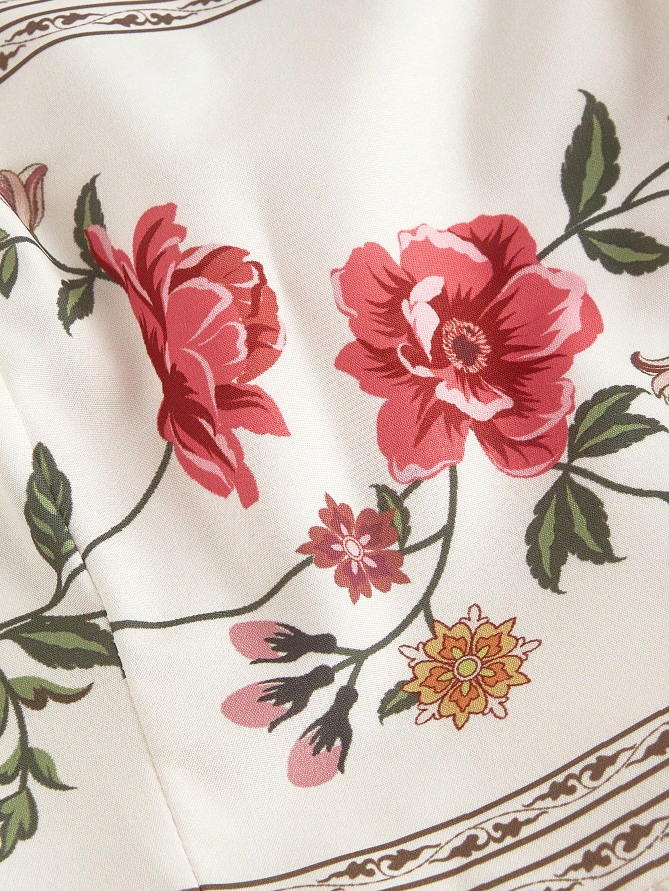 Elegant white A-line midi dress with red floral border print and spaghetti straps2