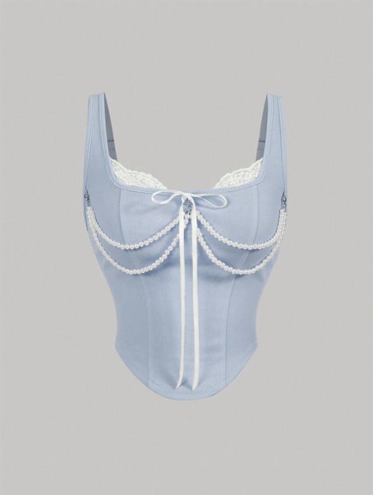 Light blue corset with lace details on a gray background
