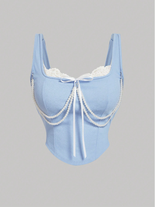 Light blue corset with lace details on a gray background