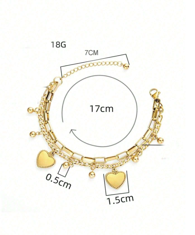 Gold bracelet with heart charms and measurement details on a white background