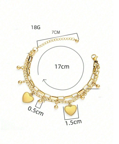Gold bracelet with heart charms and measurement details on a white background