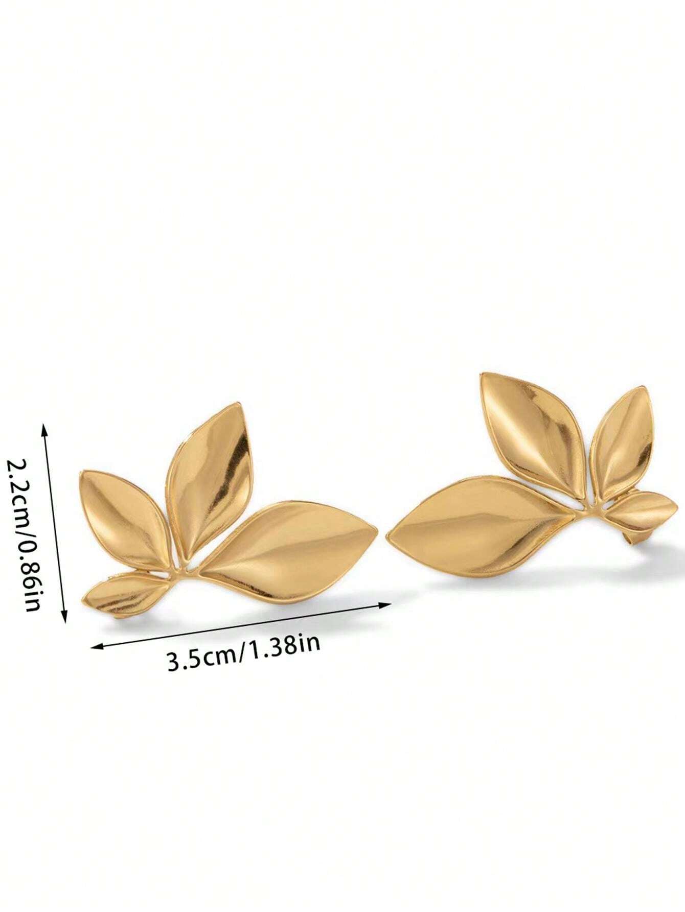 Gold leaf-shaped earrings with measurements on a white background