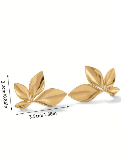 Gold leaf-shaped earrings with measurements on a white background