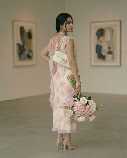 Fashzeo women's pastel pink floral print midi dress with draped cowl neck and ruched side ruffles.
