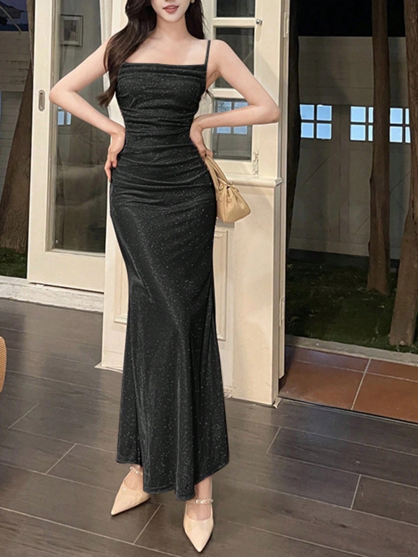 Fashzeo Black ruched mermaid long dress with spaghetti straps and shimmer fabric, designed for premium Indian party wear.