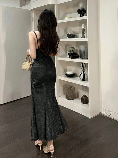 Fashzeo Black ruched mermaid long dress with spaghetti straps and shimmer fabric, designed for premium Indian party wear.