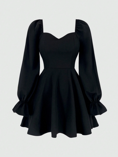 Fashzeo Black women's long sleeve floral mini dress with sweetheart neckline, smocked back, and ruffle flared hem in a romantic cottagecore style.