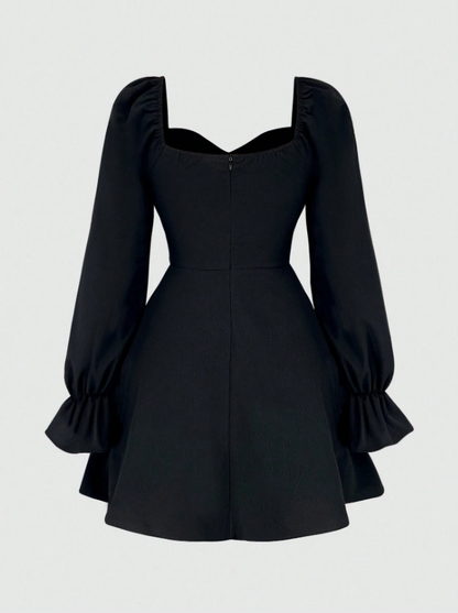 Fashzeo Black women's long sleeve floral mini dress with sweetheart neckline, smocked back, and ruffle flared hem in a romantic cottagecore style.1