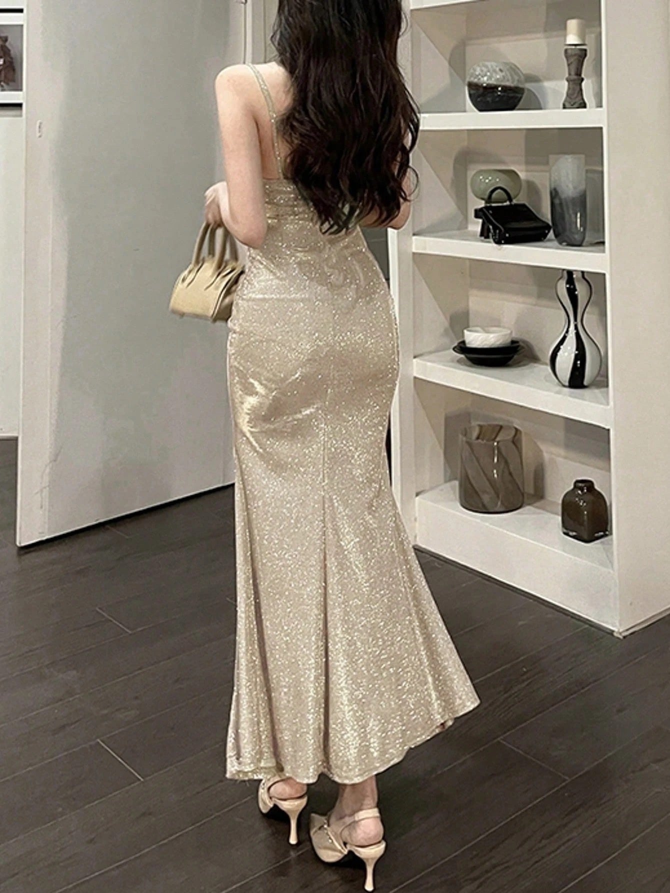 Fashzeo Champagne ruched mermaid long dress with spaghetti straps and shimmer fabric, designed for premium Indian party wear.