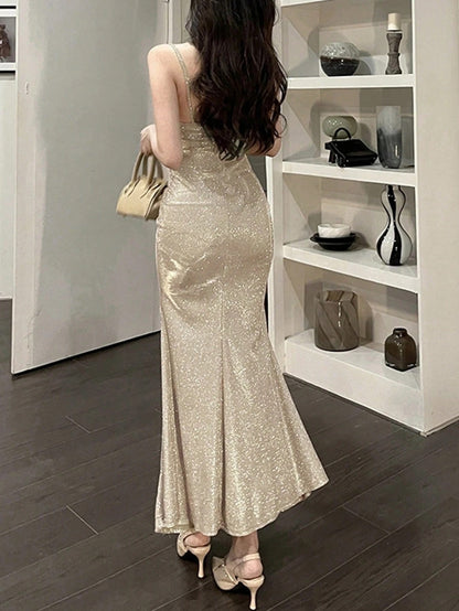 Fashzeo Champagne ruched mermaid long dress with spaghetti straps and shimmer fabric, designed for premium Indian party wear.