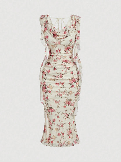 Model wearing Fashzeo cream floral print midi dress with draped cowl neck and side ruffle details for a party wear look.