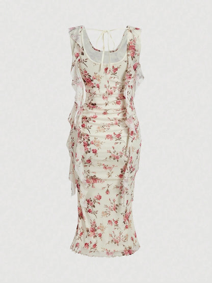 Model wearing Fashzeo cream floral print midi dress with draped cowl neck and side ruffle details for a party wear look.