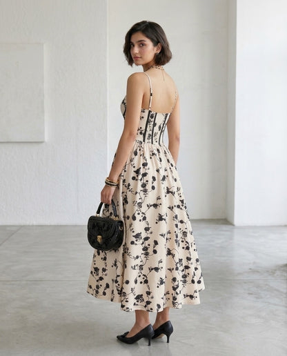 Fashzeo women's monochrome floral print midi dress with a structured corset bustier bodice and black contrast piping.