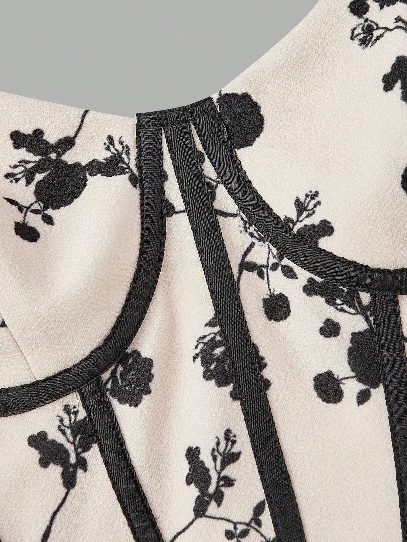 Fashzeo women's monochrome floral print midi dress with a structured corset bustier bodice and black contrast piping.