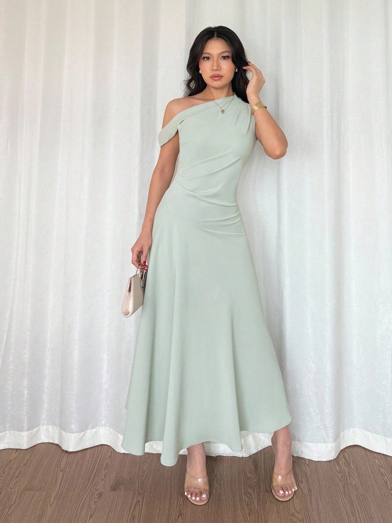 Fashzeo Pastel green one-shoulder fit and flare dress with dramatic ruffle detail for summer vacations and graduation ceremonies