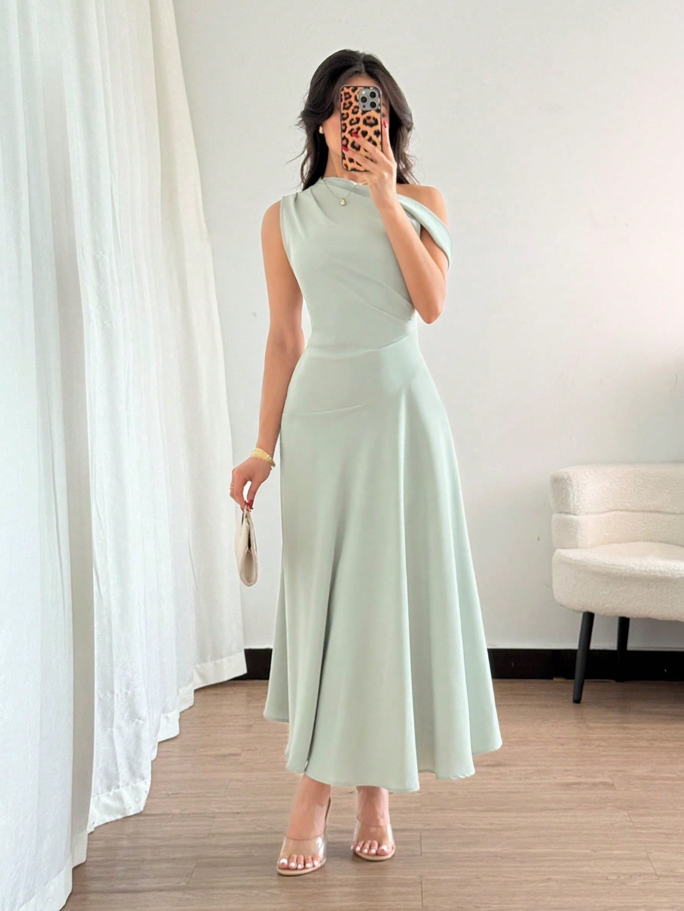 Fashzeo Pastel green one-shoulder fit and flare dress with dramatic ruffle detail for summer vacations and graduation ceremonies3