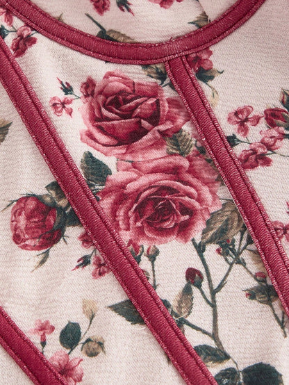 Fashzeo women's pink rose floral print midi dress featuring a structured corset bustier bodice with red contrast piping.