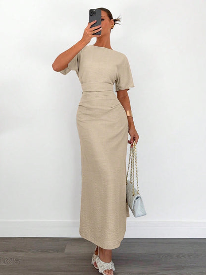 Fashzeo apricot linen blend long dress featuring a square neck, high slit, and ruffled fishtail hem for a quiet luxury aesthetic.