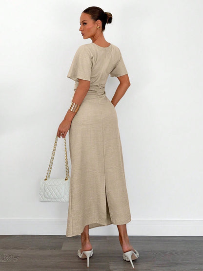 Fashzeo apricot linen blend long dress featuring a square neck, high slit, and ruffled fishtail hem for a quiet luxury aesthetic.1