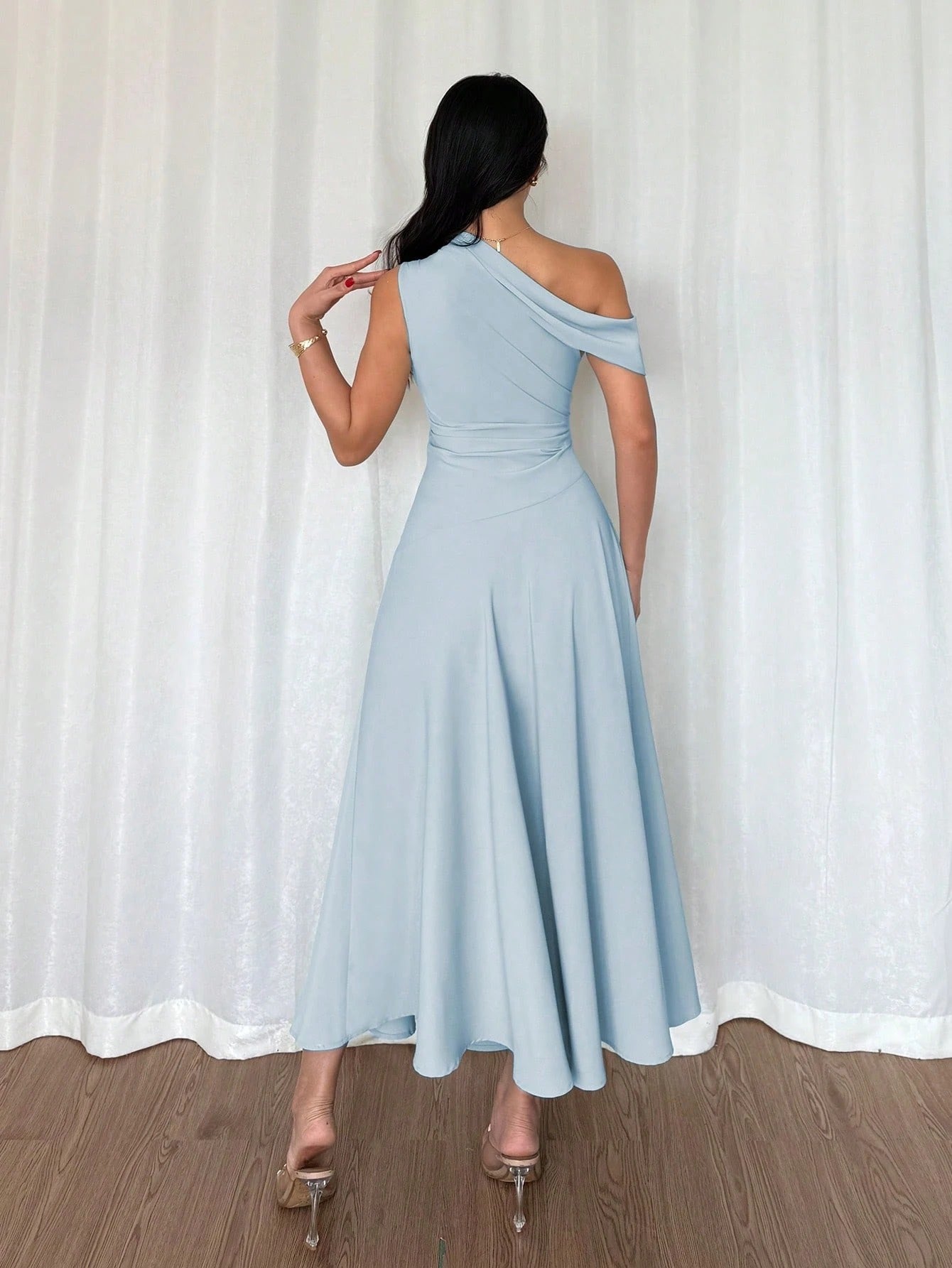 Fashzeo baby blue one-shoulder fit and flare dress with dramatic ruffle detail for summer vacations and graduation ceremonies.1