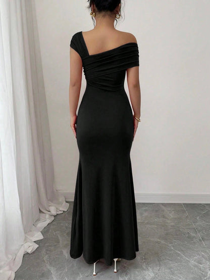 Fashzeo black asymmetrical beaded mermaid long dress featuring a sleek one-shoulder neckline and floor-length evening gown silhouette