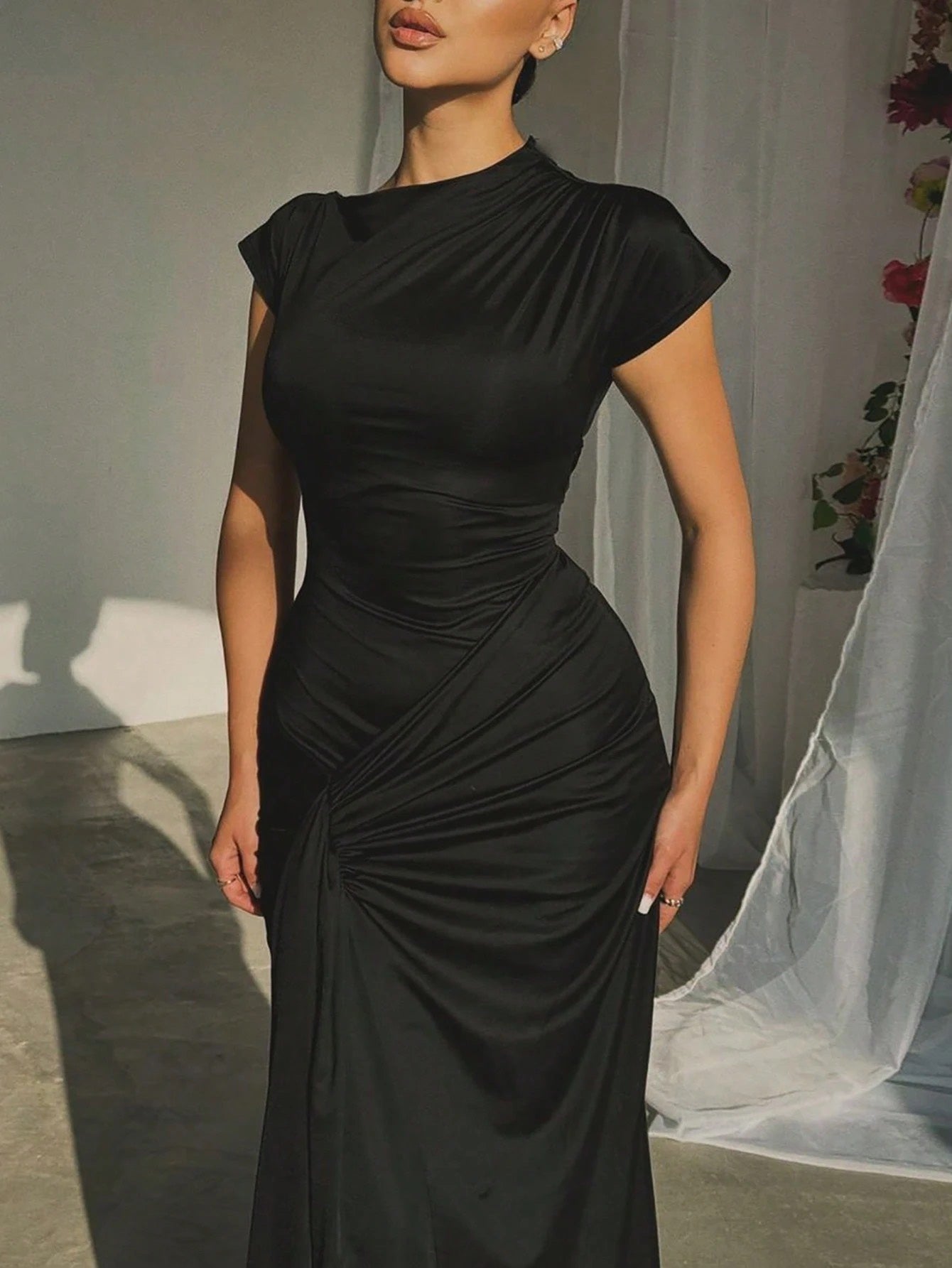 Fashzeo black lace-up bandage mini dress featuring ruffle sleeves and a corset-style front for a vintage coquette aesthetic.2