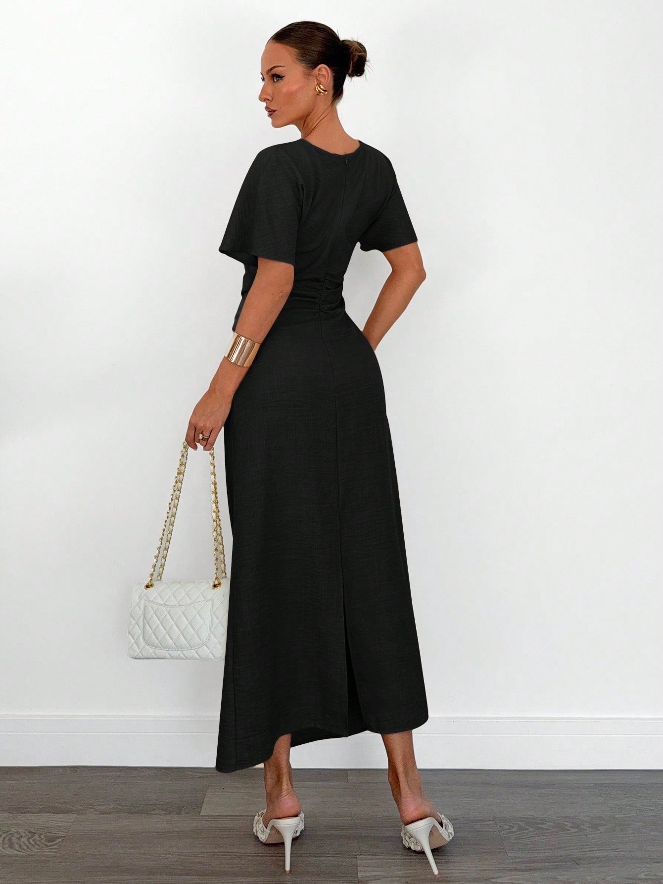 Fashzeo black linen blend long dress featuring a square neck, high slit, and ruffled fishtail hem for a quiet luxury aesthetic.1