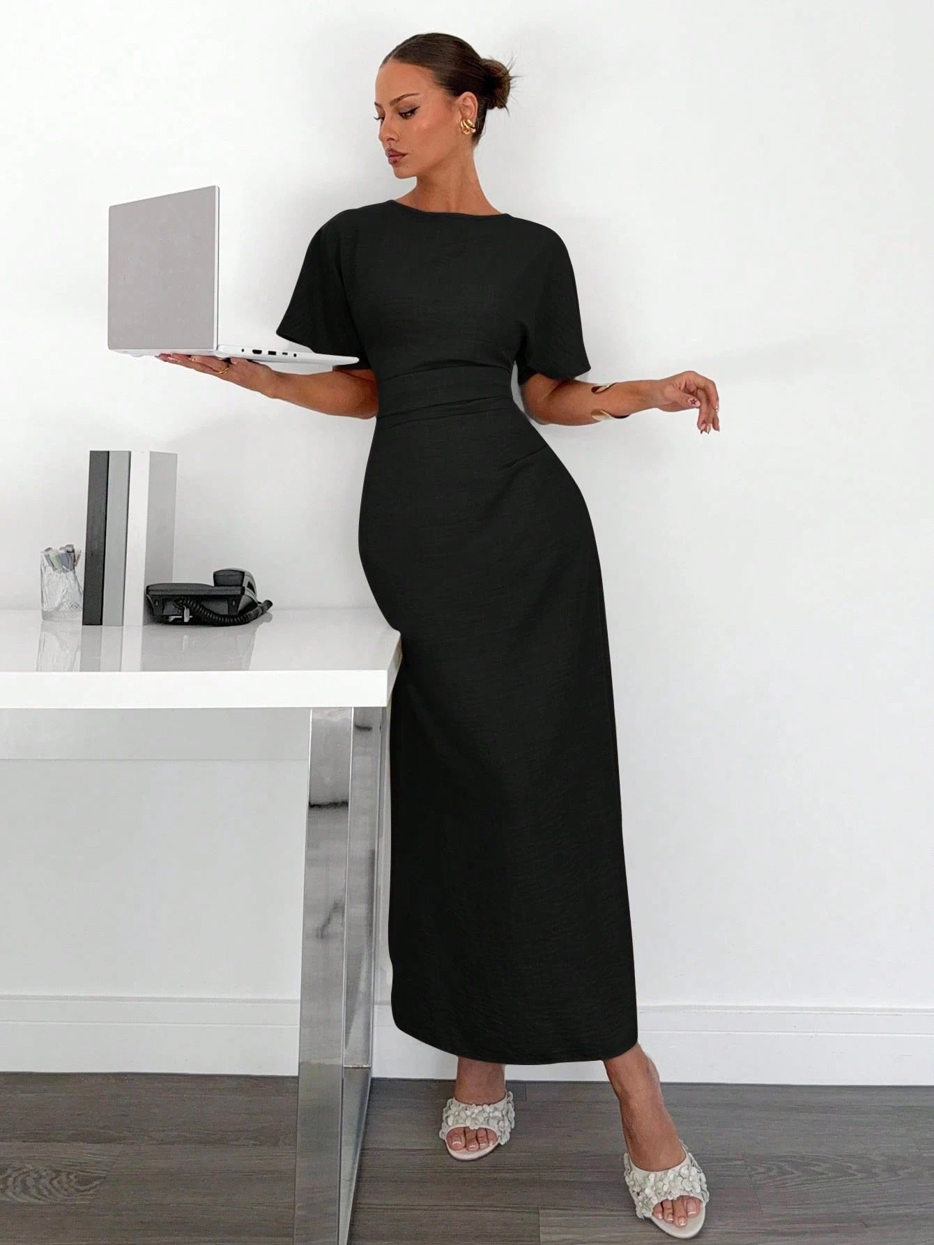 Fashzeo black linen blend long dress featuring a square neck, high slit, and ruffled fishtail hem for a quiet luxury aesthetic.4