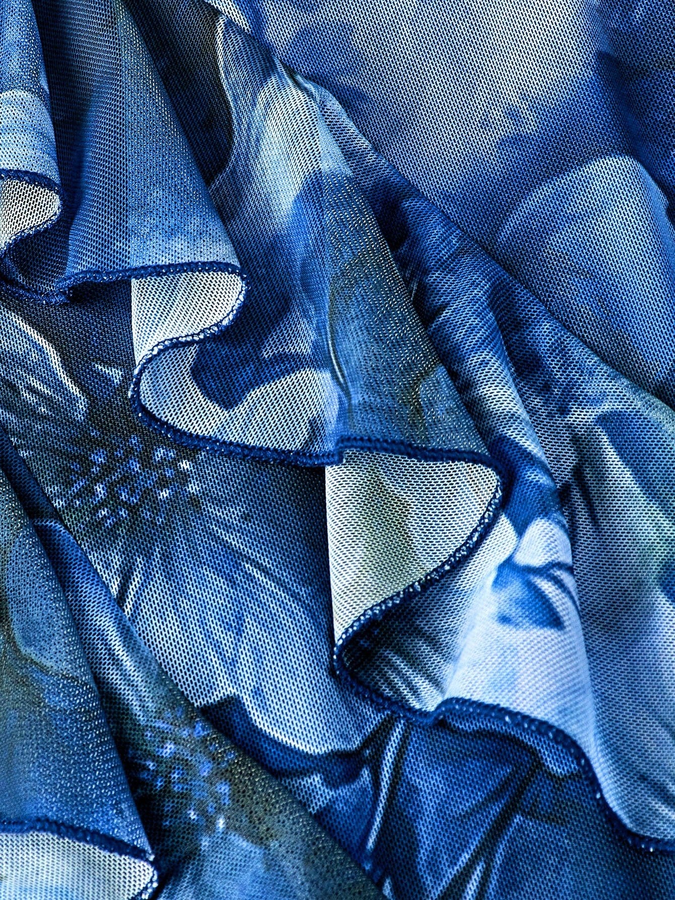 Fashzeo blue floral long dress with high slit, ruffle hem, and sexy backless design for women's party and vacation fashion.4